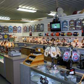 JT Fashions Leather handbags, jewelry, night lights, candles at the Walnut Creek Amish Flea Market